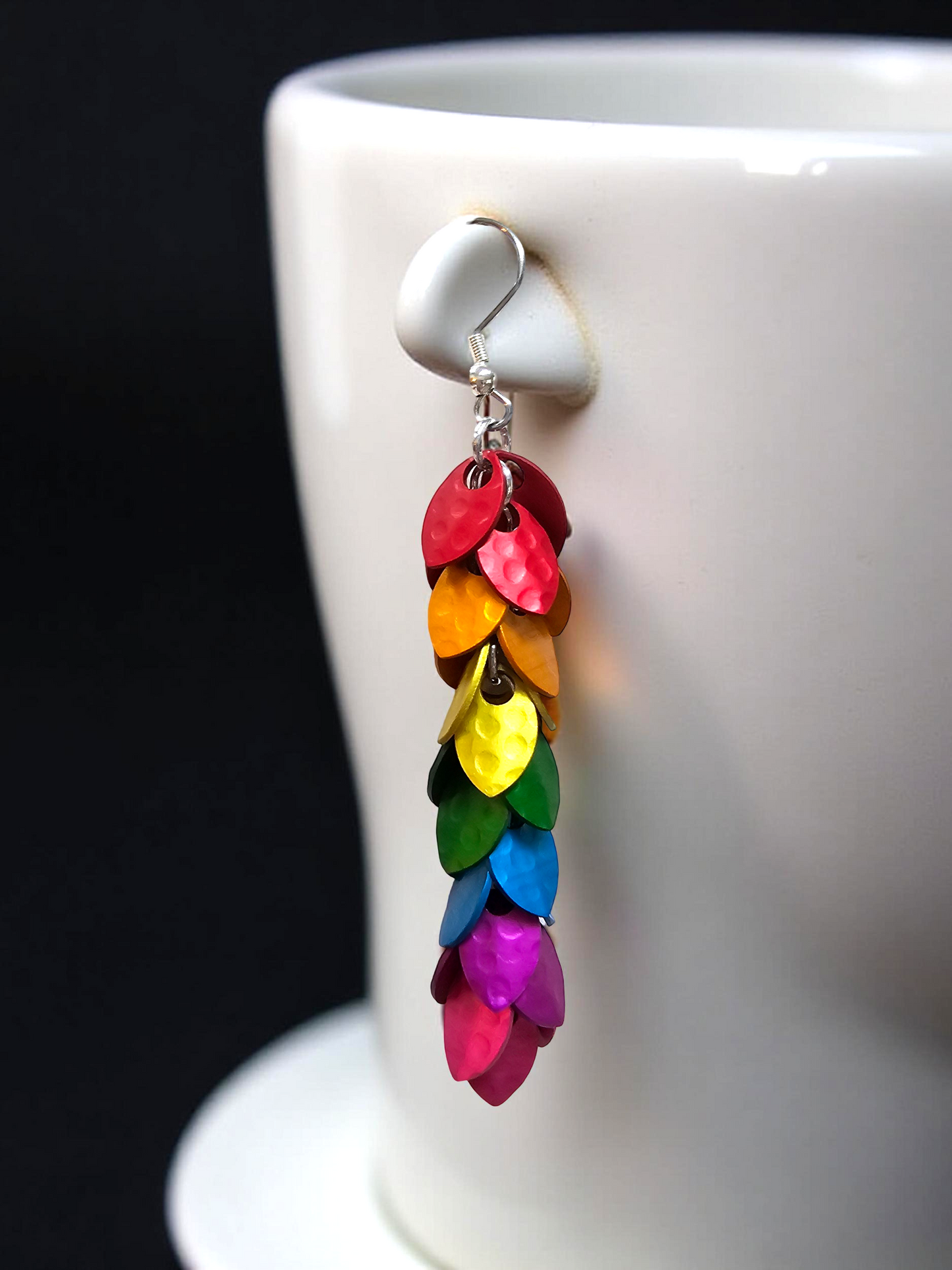 Rainbow Dragon Scale Earrings on mug