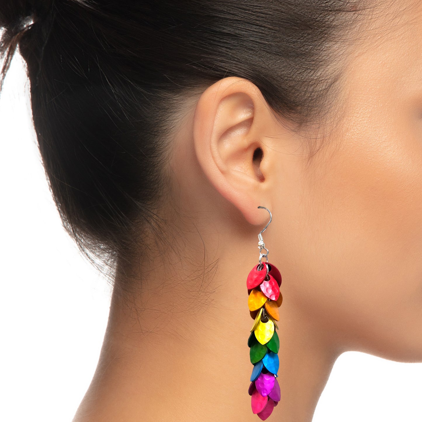 Rainbow Dragon Scale Earrings on earlobe