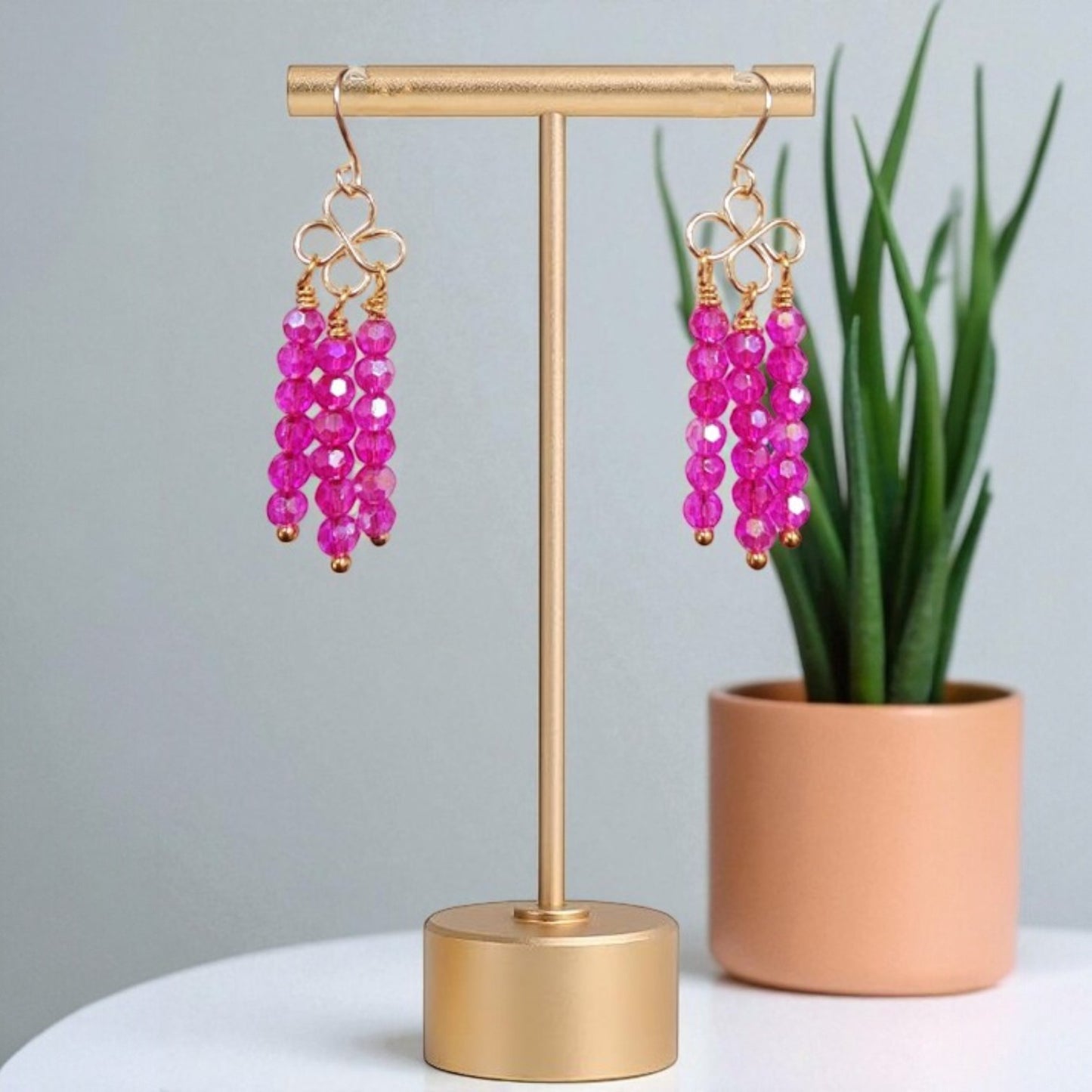 Pink rondell celtic knot earrings
