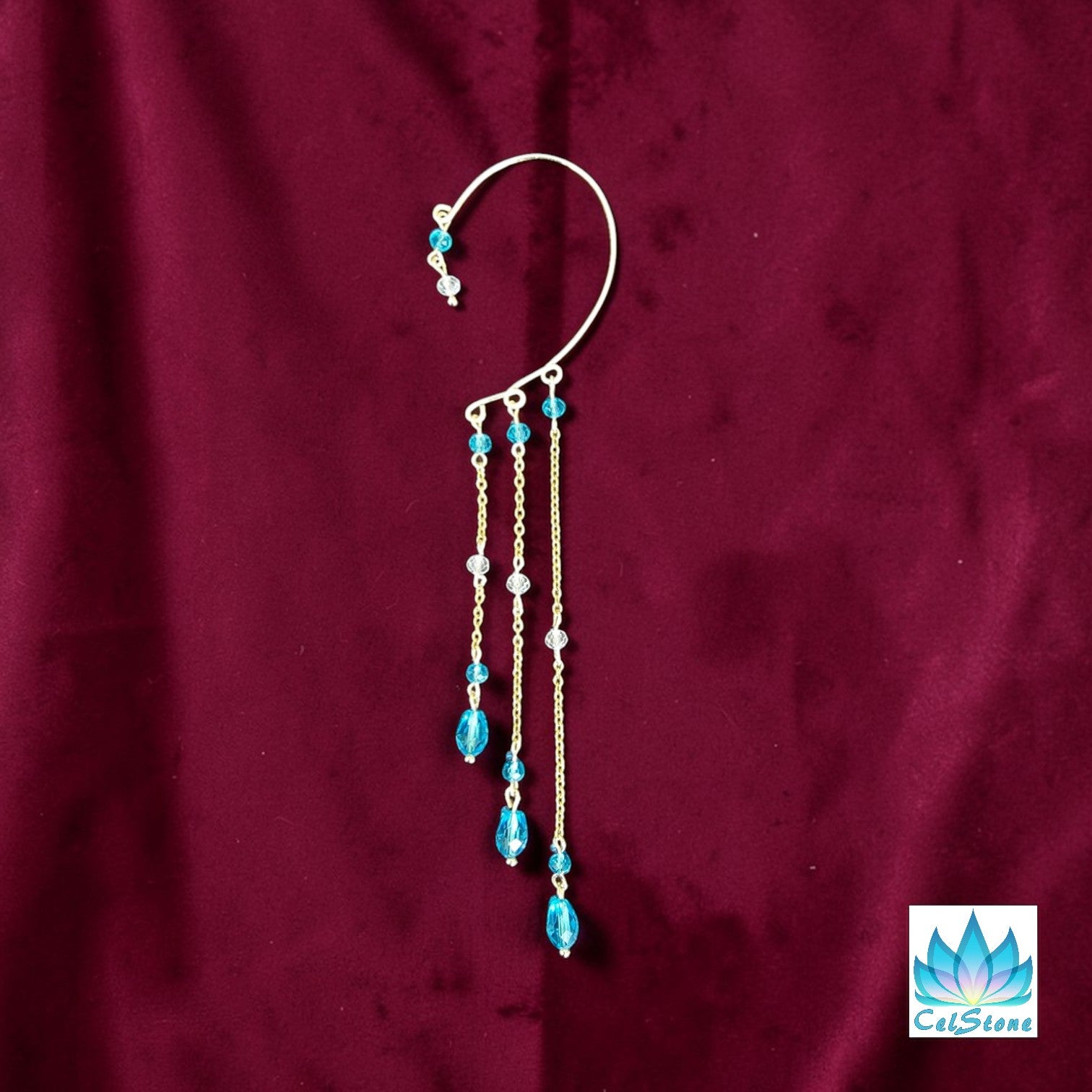 over ear cuff on red fabric